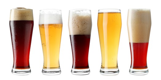 Different types of beer in glasses isolated on white, set