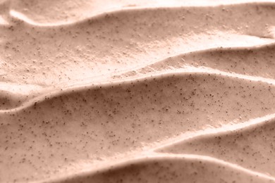 Image of Scrub in shade of mocha mousse, closeup. Color of 2025 year