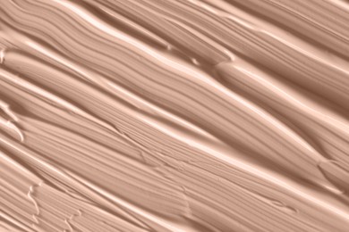 Image of Liquid foundation in shade of mocha mousse, top view. Color of 2025 year