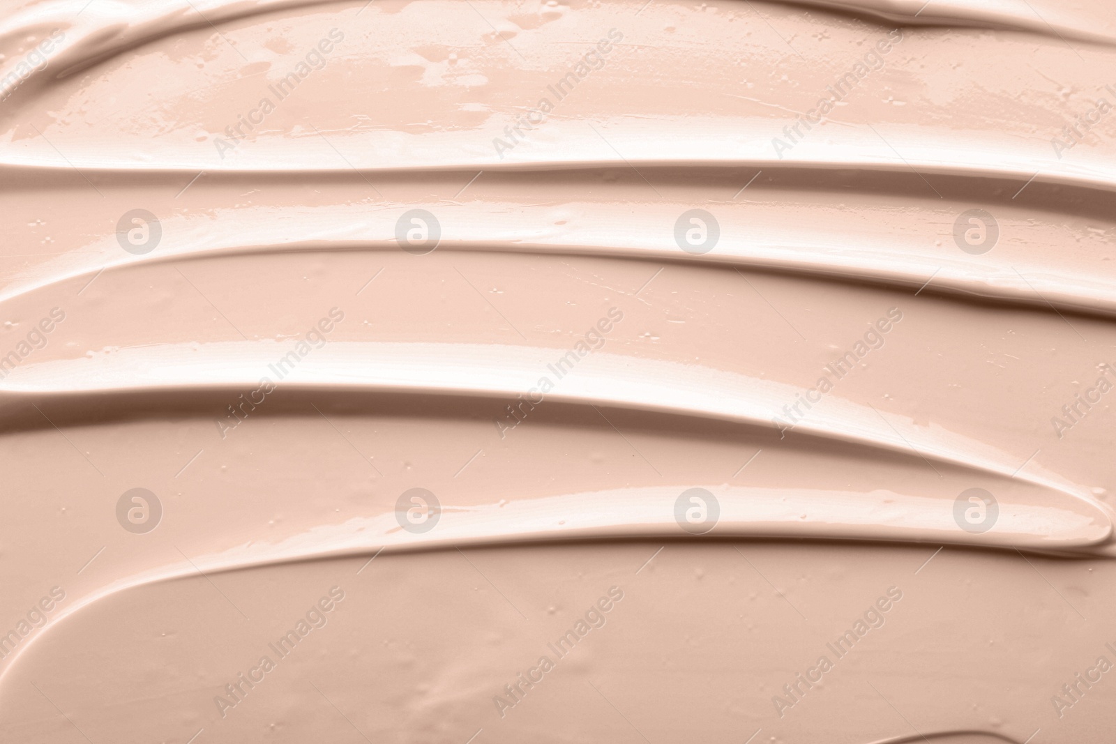 Image of Liquid foundation in shade of mocha mousse, top view. Color of 2025 year