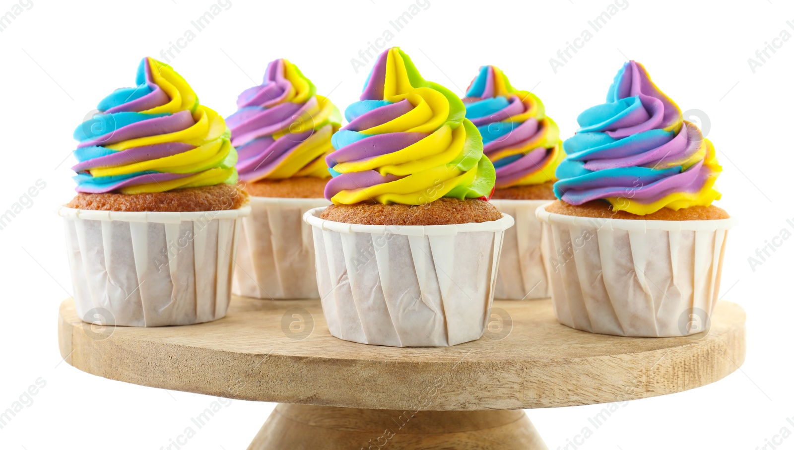 Photo of Tasty cupcakes with colorful cream isolated on white