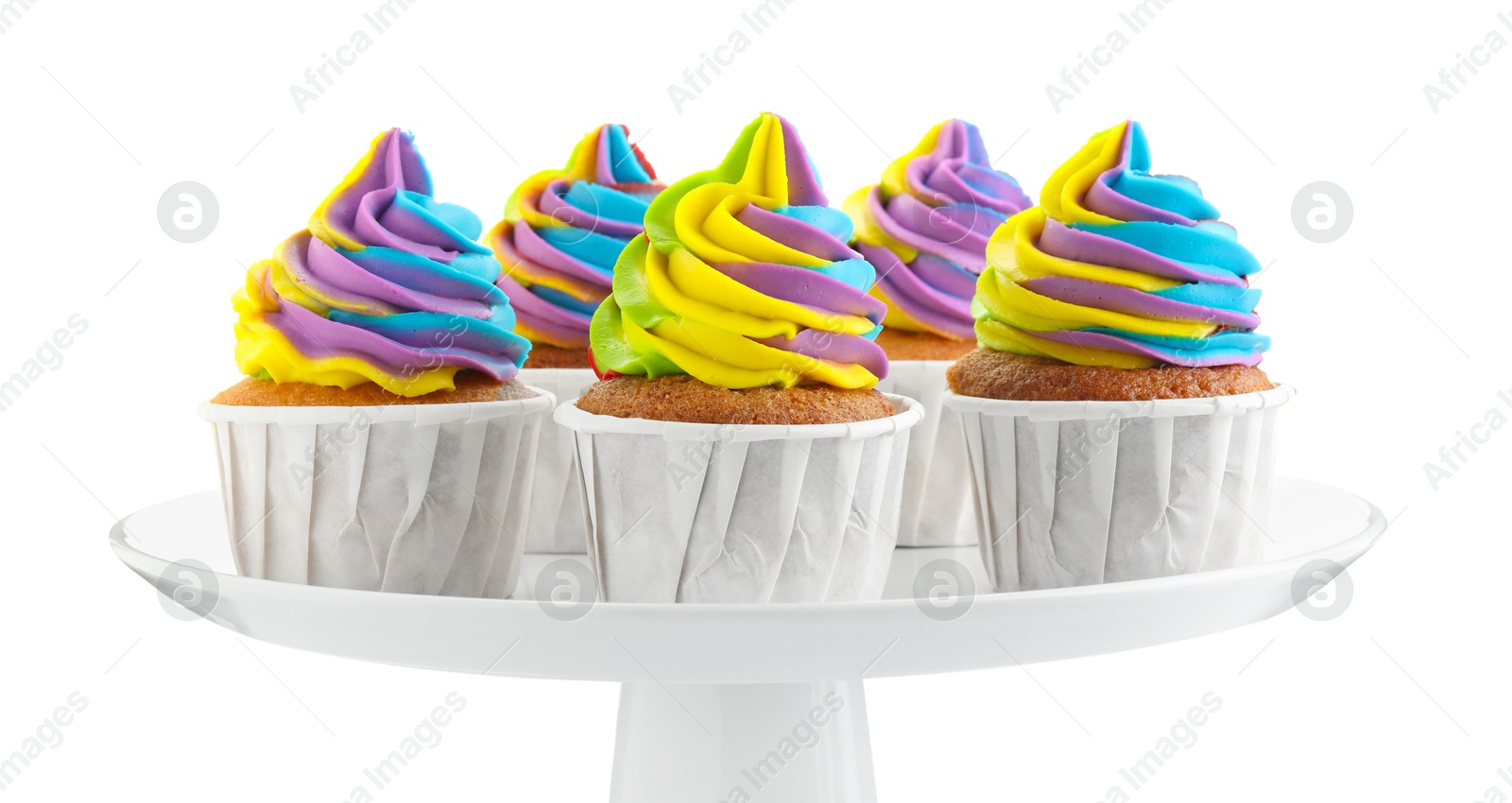 Photo of Tasty cupcakes with colorful cream isolated on white