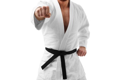 Photo of Man in uniform practicing karate on white background, closeup