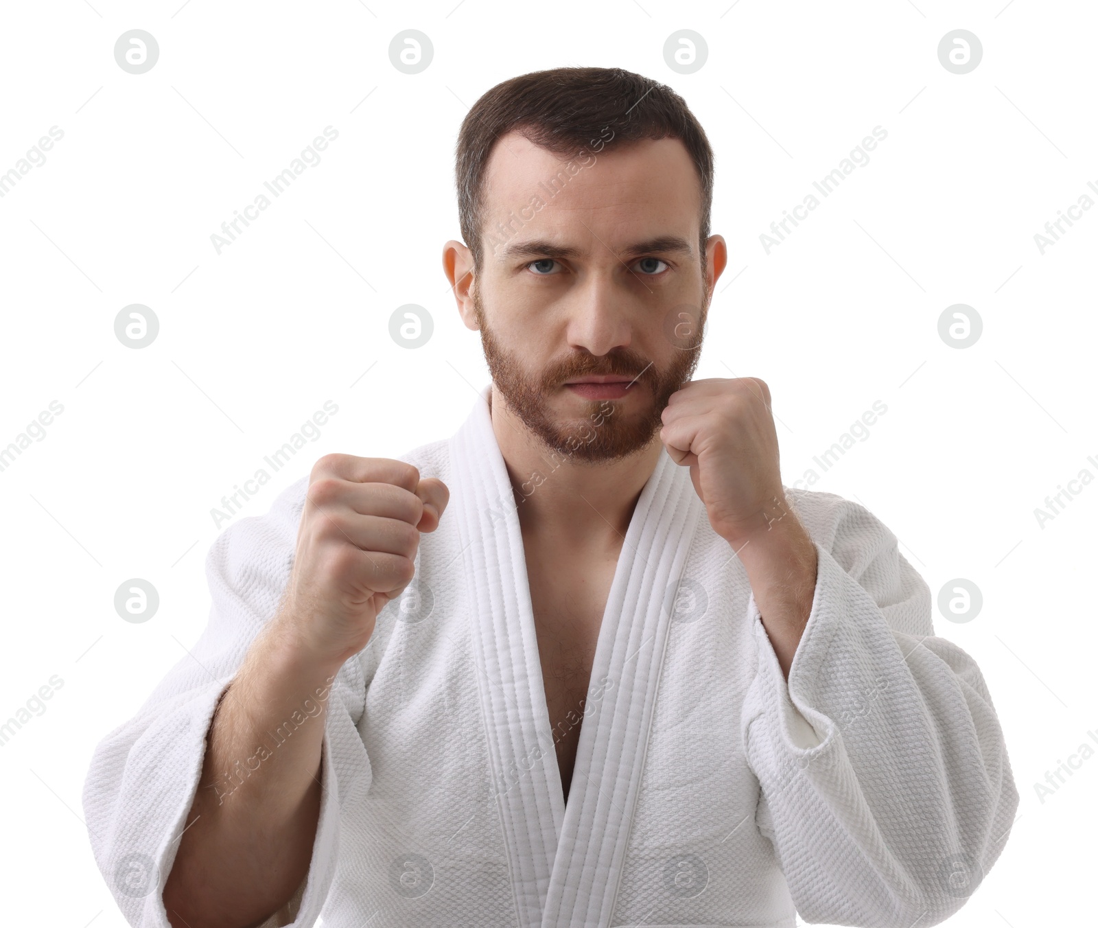 Photo of Karate fighter in uniform on white background