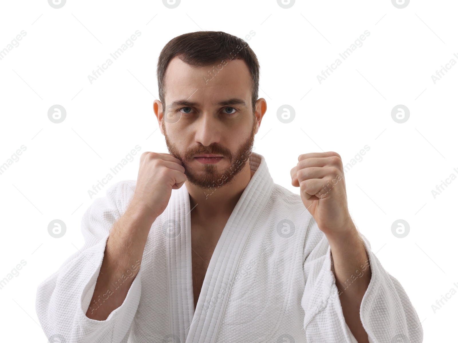 Photo of Karate fighter in uniform on white background