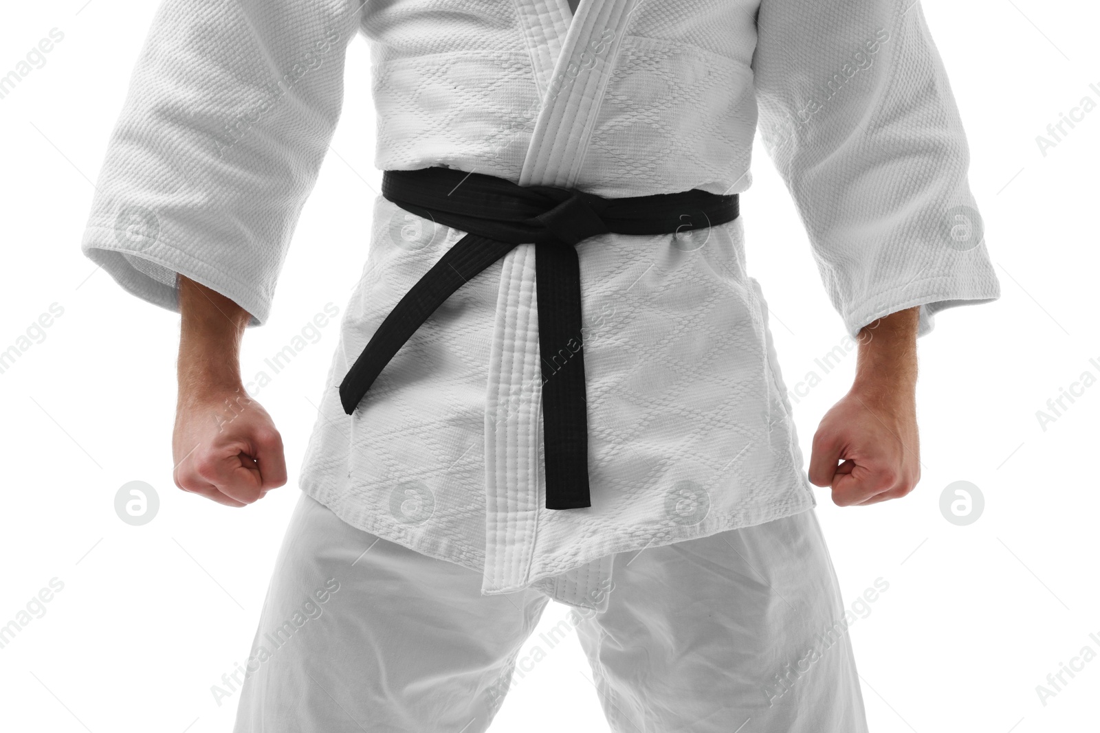 Photo of Karate fighter in uniform on white background, closeup