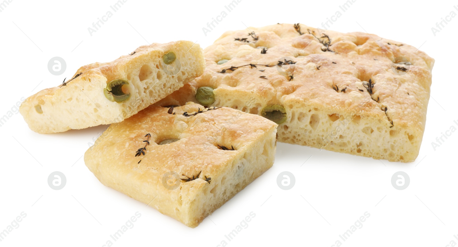 Photo of Pieces of delicious focaccia bread with olives and thyme isolated on white