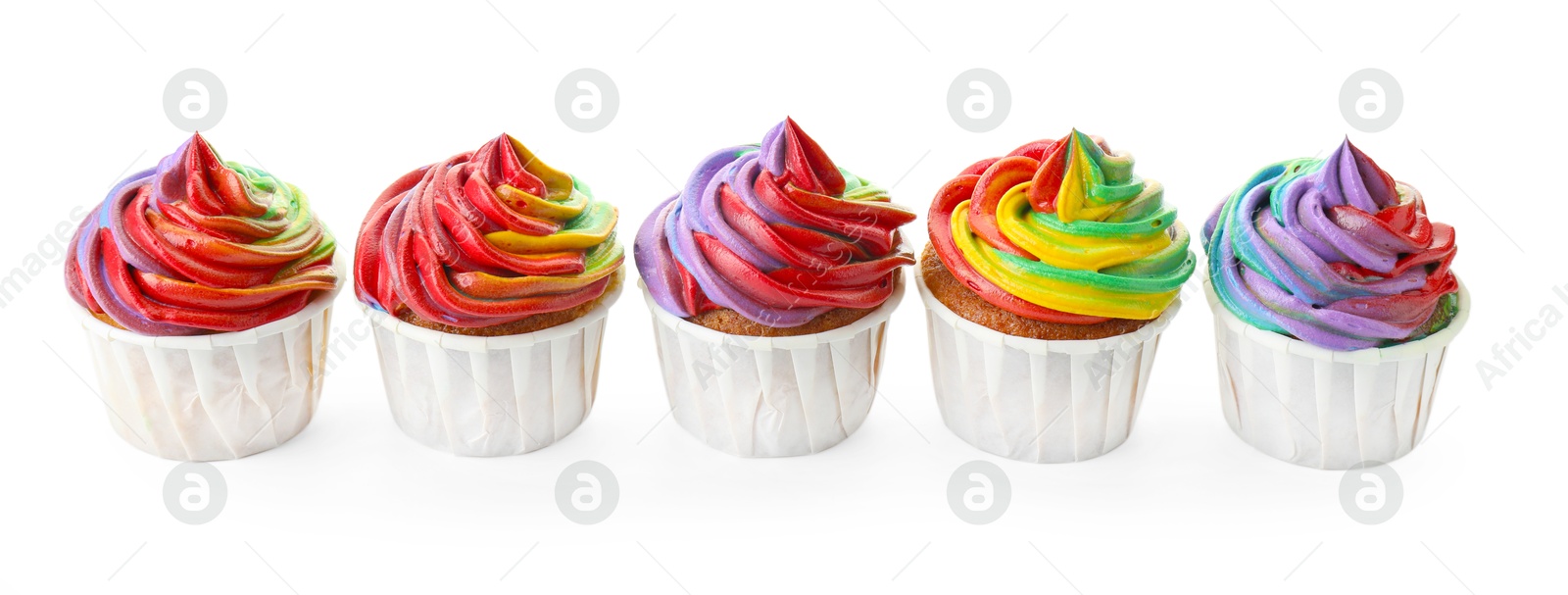 Photo of Delicious cupcakes with colorful cream isolated on white