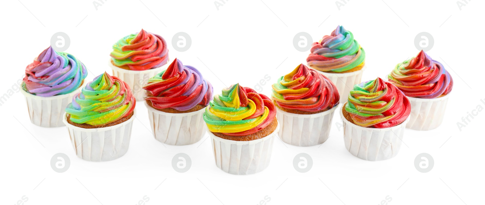 Photo of Delicious cupcakes with colorful cream isolated on white