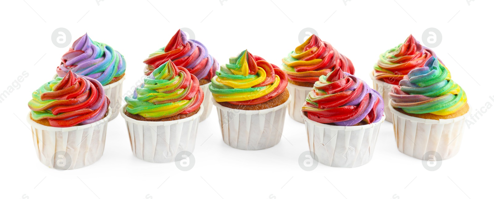 Photo of Delicious cupcakes with colorful cream isolated on white