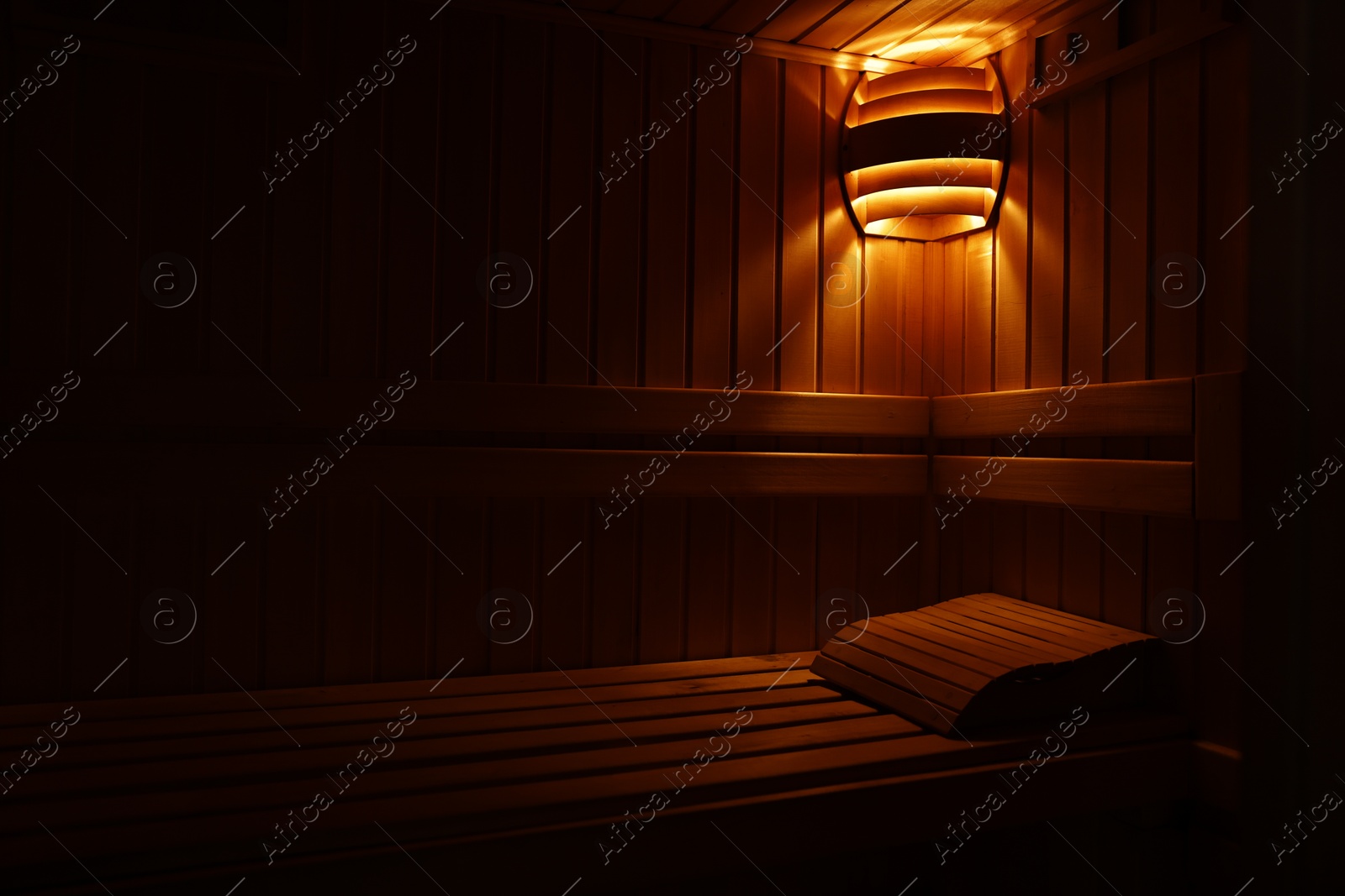 Photo of View of empty wooden sauna with bench