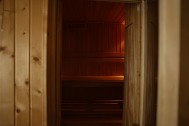 Photo of View of empty wooden sauna with bench