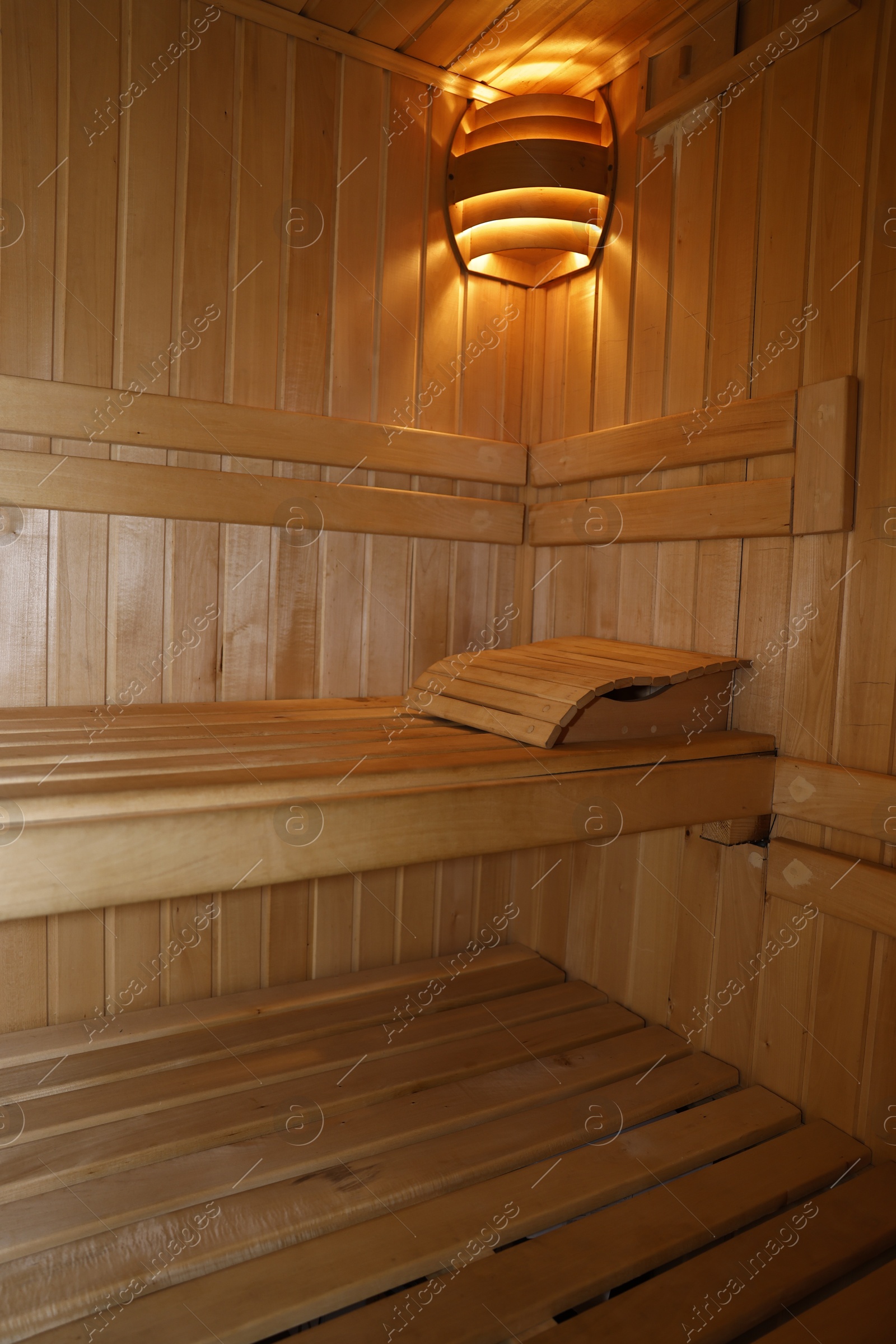 Photo of View of empty wooden sauna with bench