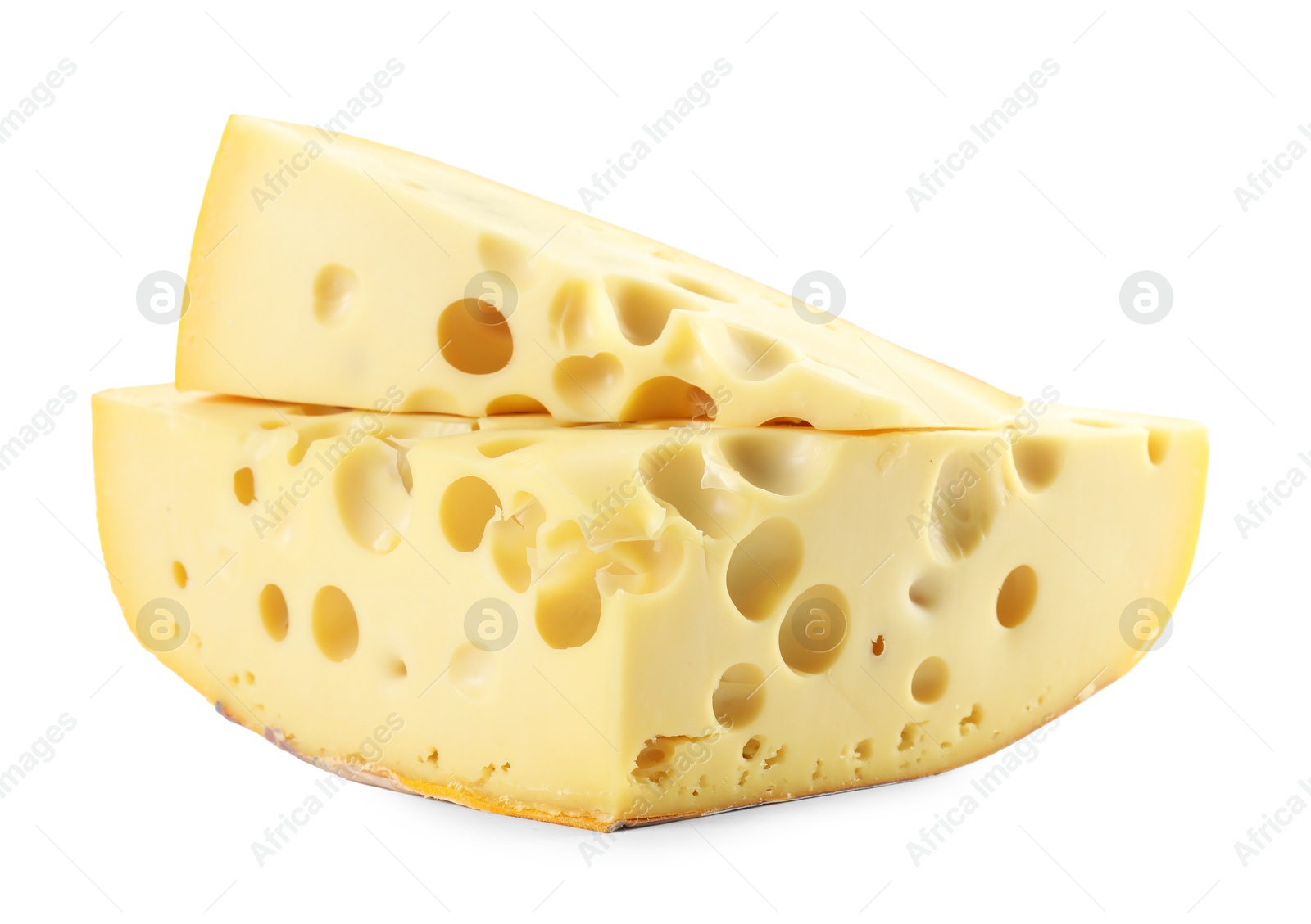 Photo of Pieces of tasty cheese isolated on white