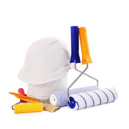 Photo of Building material, hardhat and different construction tools isolated on white