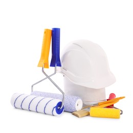 Photo of Building material, hardhat and different construction tools isolated on white