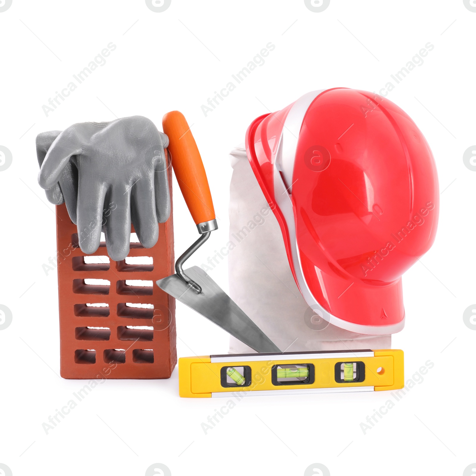 Photo of Building materials, safety equipment and construction tools isolated on white