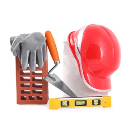 Photo of Building materials, safety equipment and construction tools isolated on white