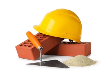 Photo of Construction materials, hardhat and bucket trowel isolated on white