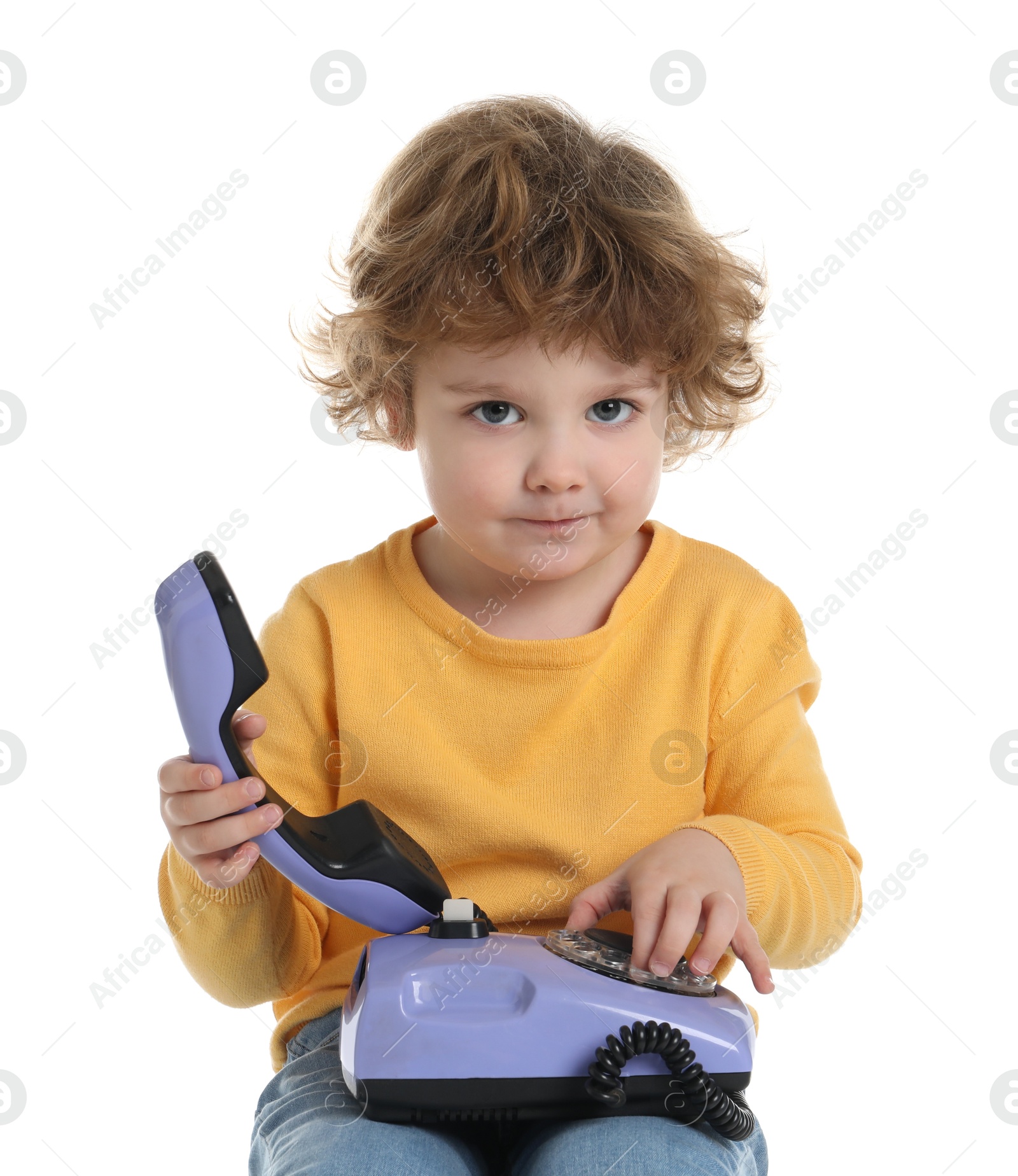 Photo of Cute little boy with telephone on white background