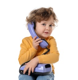 Photo of Cute little boy with telephone on white background