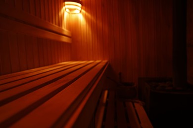 Photo of View of empty wooden sauna with bench