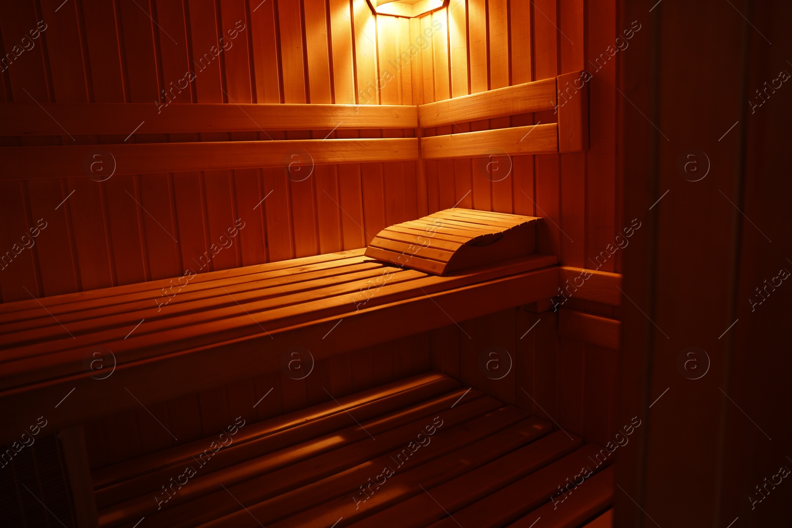 Photo of View of empty wooden sauna with bench