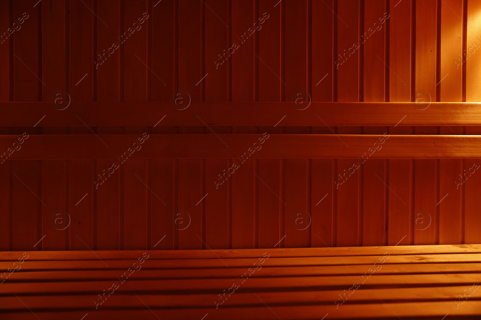 Photo of View of empty wooden sauna with bench