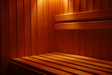 Photo of View of empty wooden sauna with bench