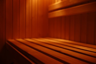 Photo of View of empty wooden sauna with bench