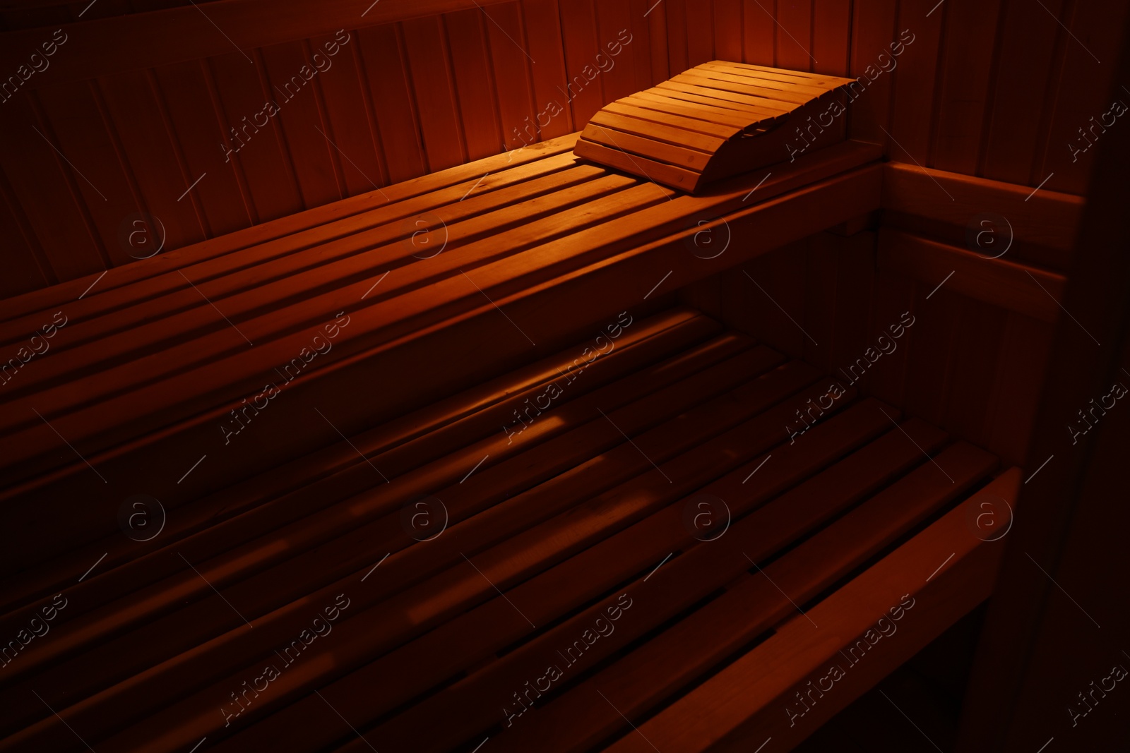 Photo of View of empty wooden sauna with bench