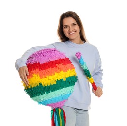 Happy woman with colorful pinata and stick on white background