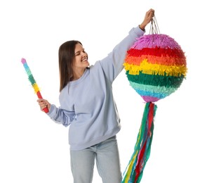 Happy woman with colorful pinata and stick on white background