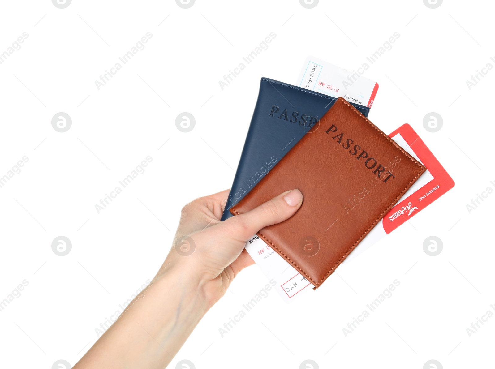 Photo of Woman holding passports with tickets on white background, closeup