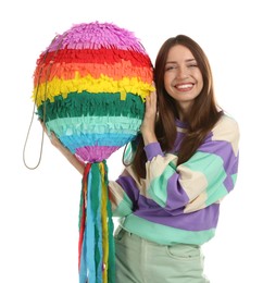 Photo of Happy woman with colorful pinata isolated on white