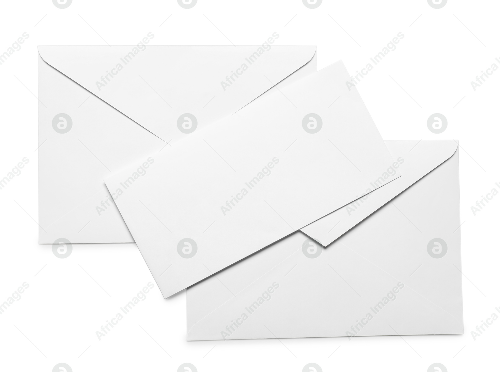 Photo of Envelopes with card isolated on white, top view. Mockup for design