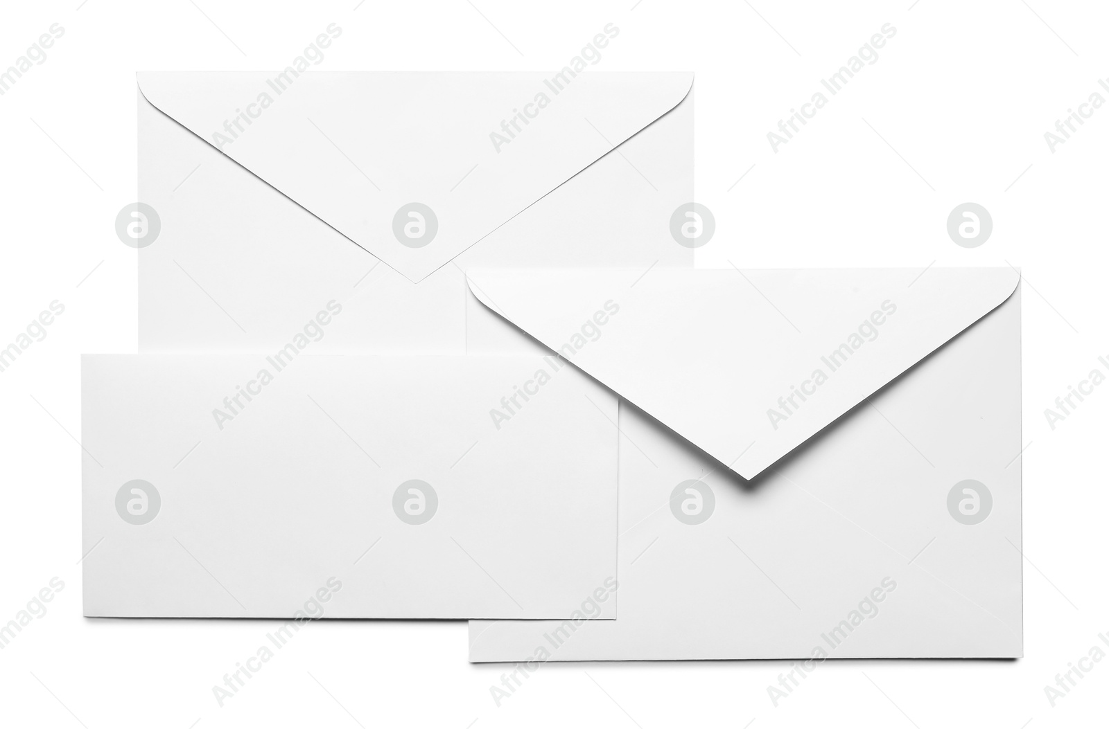 Photo of Envelopes with card isolated on white, top view. Mockup for design