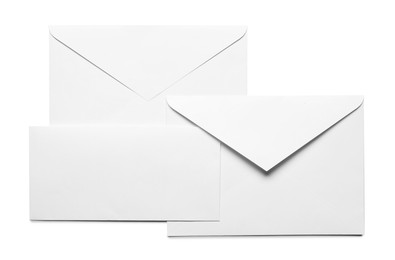 Photo of Envelopes with card isolated on white, top view. Mockup for design