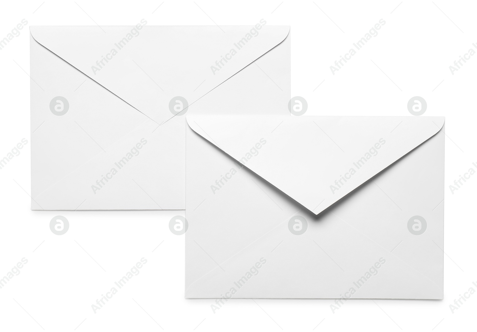 Photo of Envelopes isolated on white, top view. Mockup for design