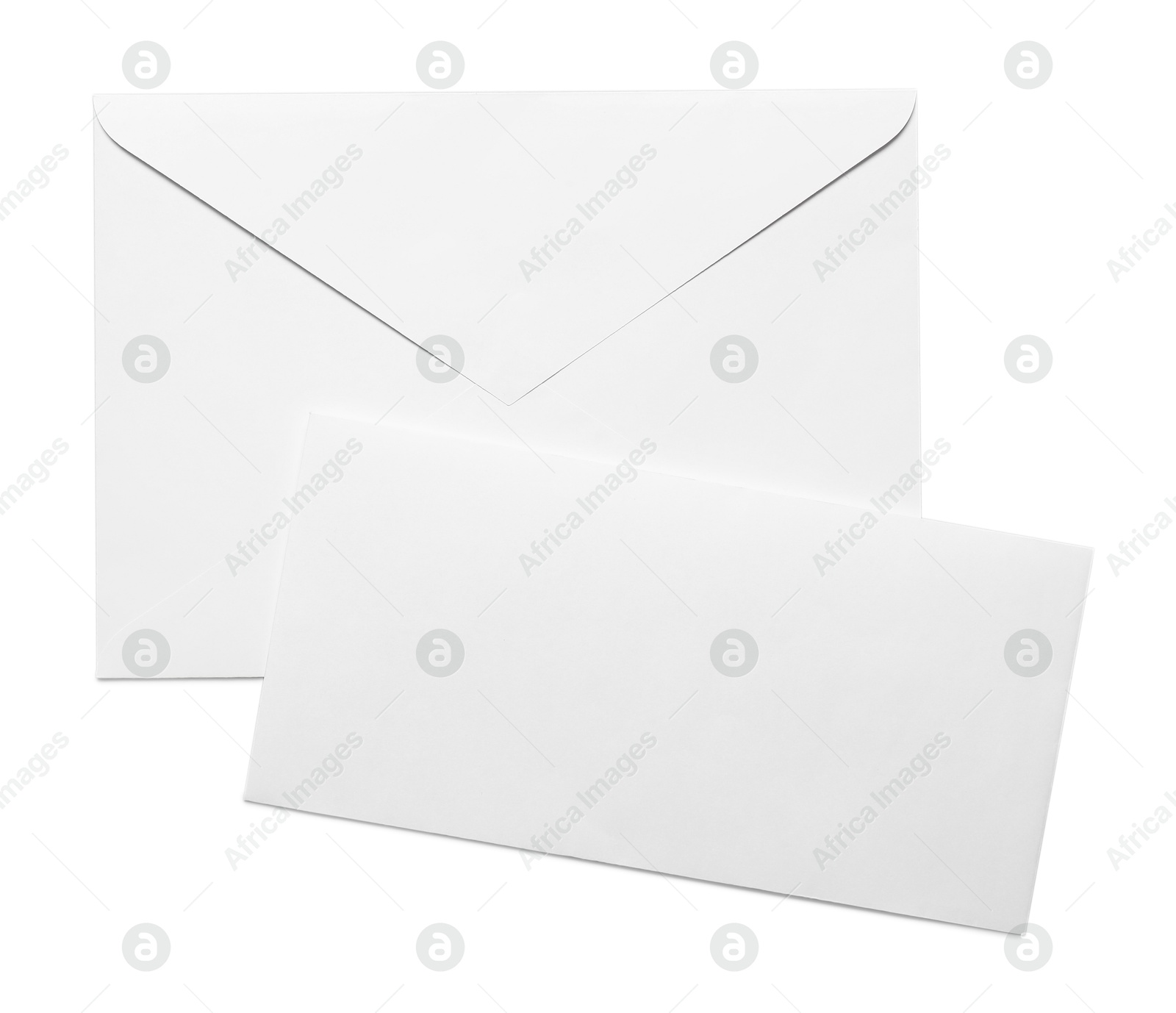 Photo of Envelope with card isolated on white, top view. Mockup for design