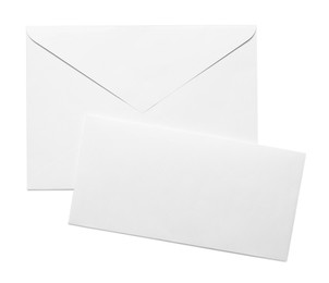 Photo of Envelope with card isolated on white, top view. Mockup for design