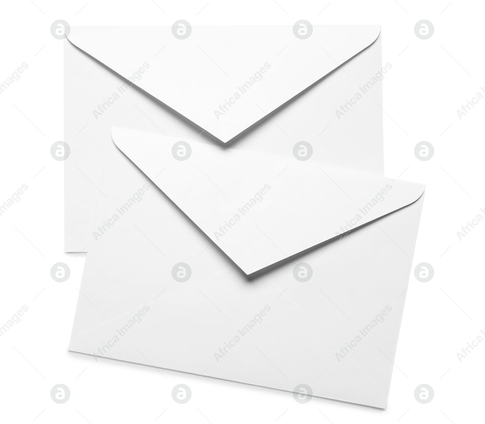 Photo of Envelopes isolated on white, top view. Mockup for design