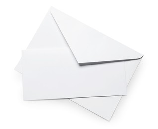 Photo of Envelope with card isolated on white, top view. Mockup for design