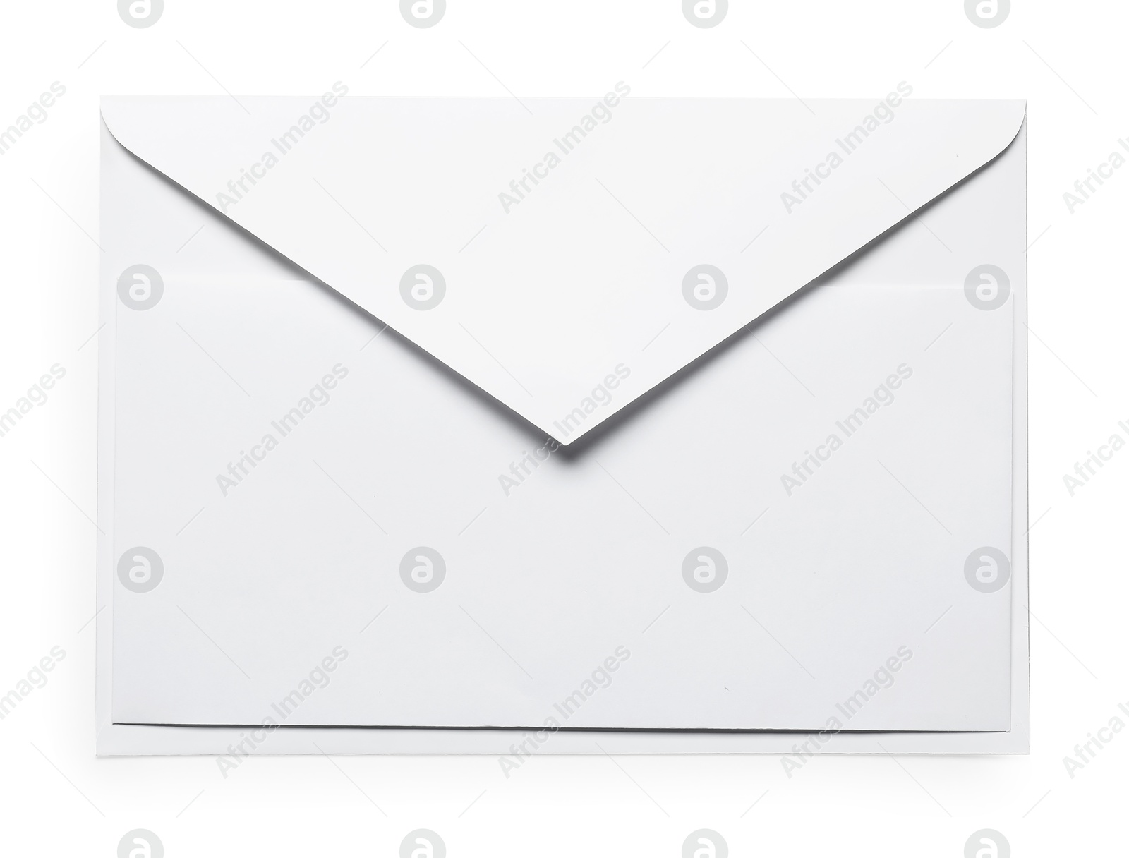 Photo of Envelope with card isolated on white, top view. Mockup for design