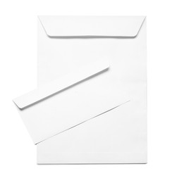 Photo of Envelopes isolated on white, top view. Mockup for design