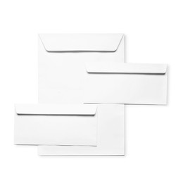 Photo of Envelopes isolated on white, top view. Mockup for design