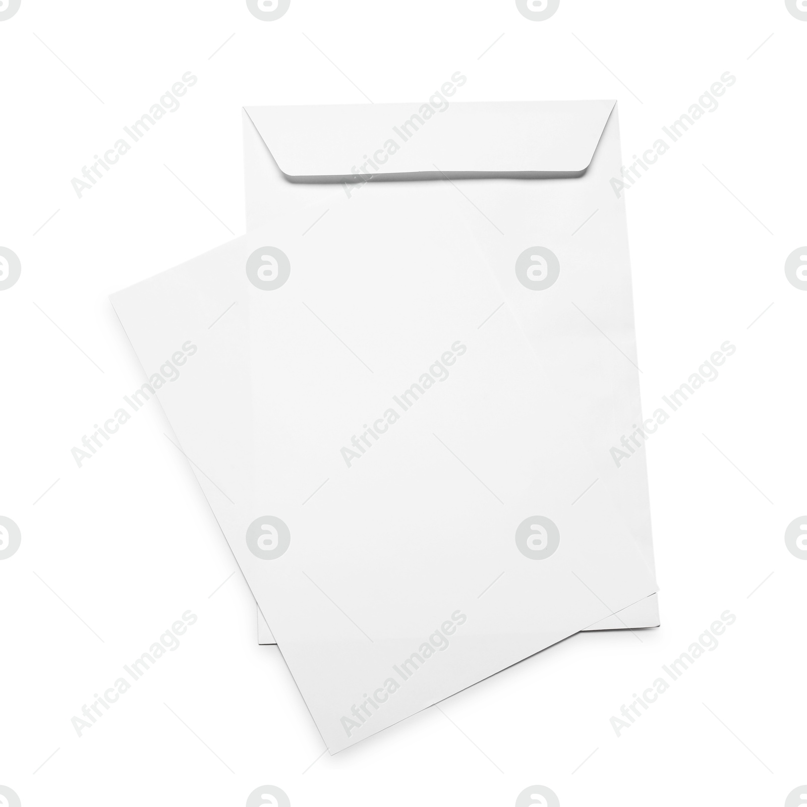 Photo of Envelope with card isolated on white, top view. Mockup for design