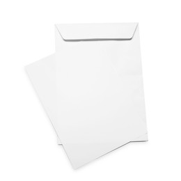 Photo of Envelope with card isolated on white, top view. Mockup for design