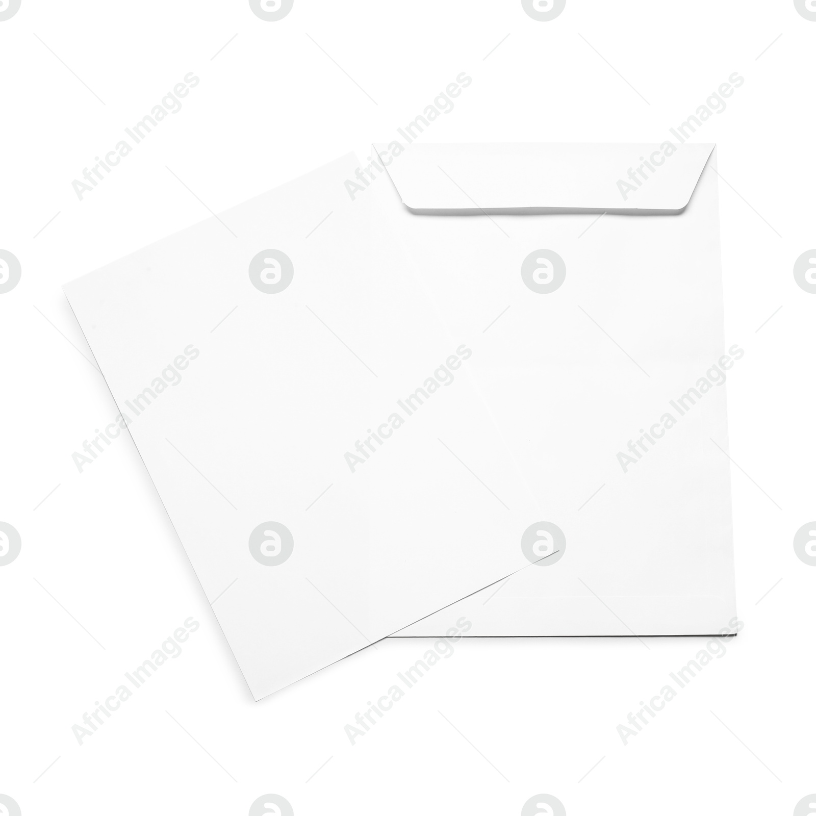 Photo of Envelope with card isolated on white, top view. Mockup for design