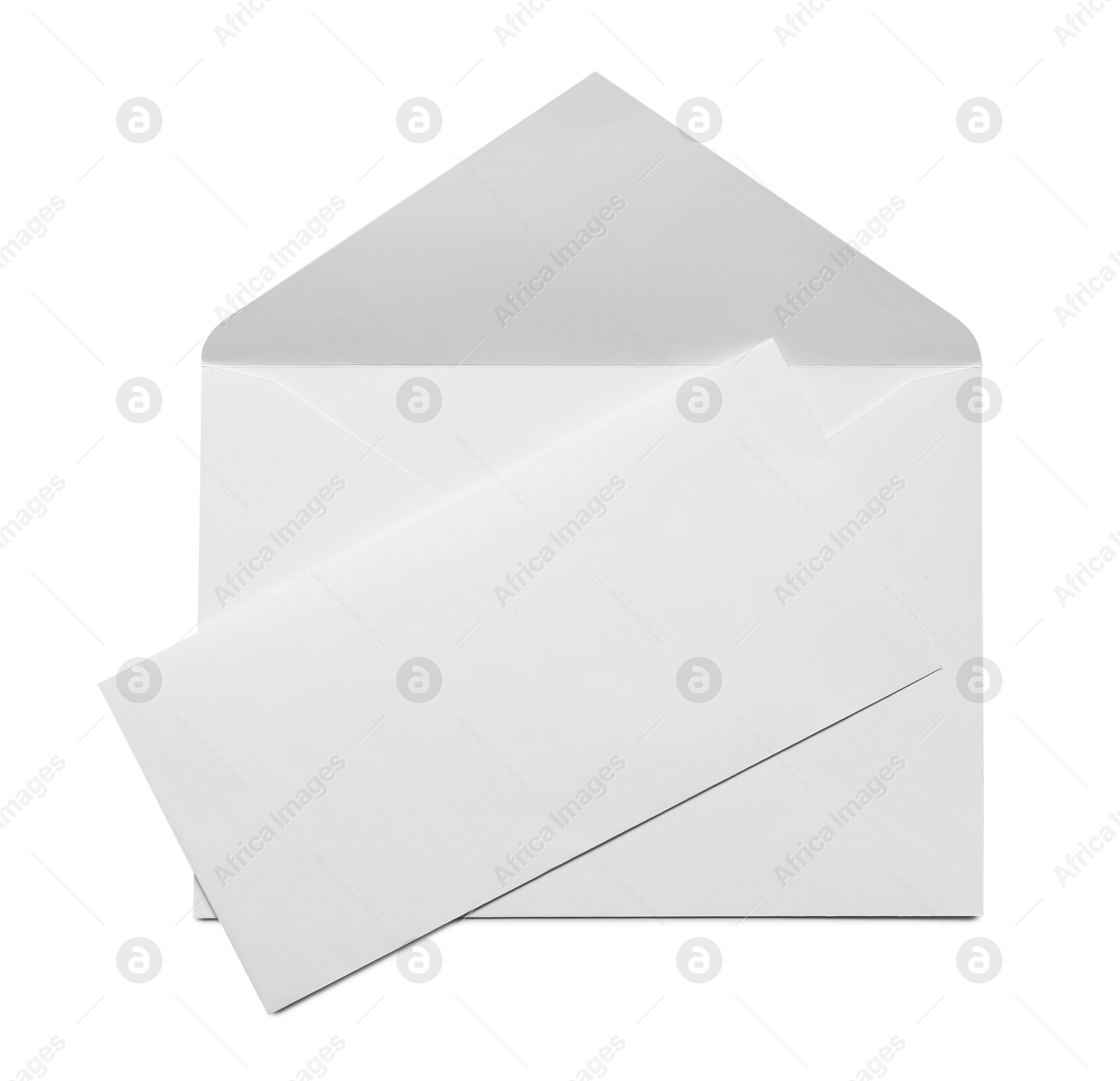 Photo of Envelope with card isolated on white, top view. Mockup for design